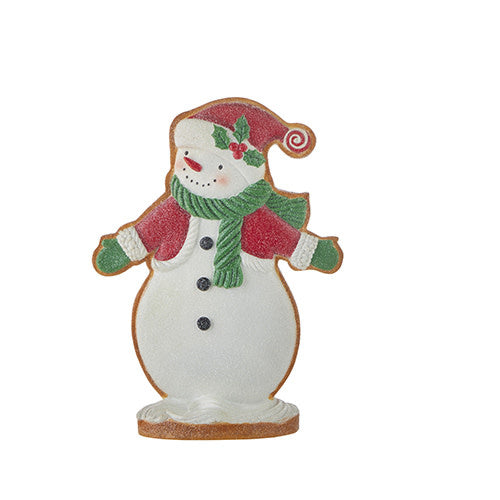 Snowman cookie with red and green jacket hat on white sugar icing