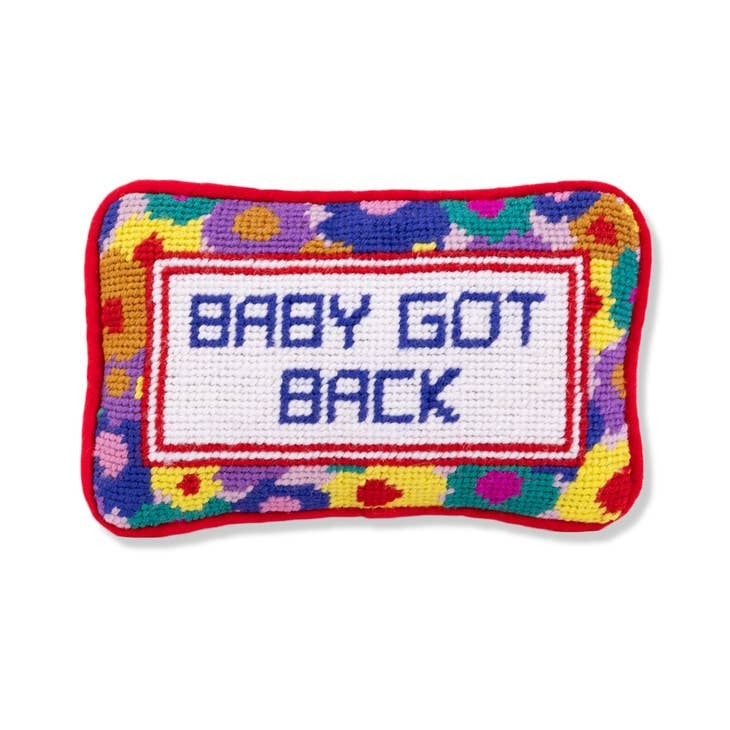 Mini needlepoint pillow with a Baby Got Back motif in wool front fabric on cotton velvet back.
