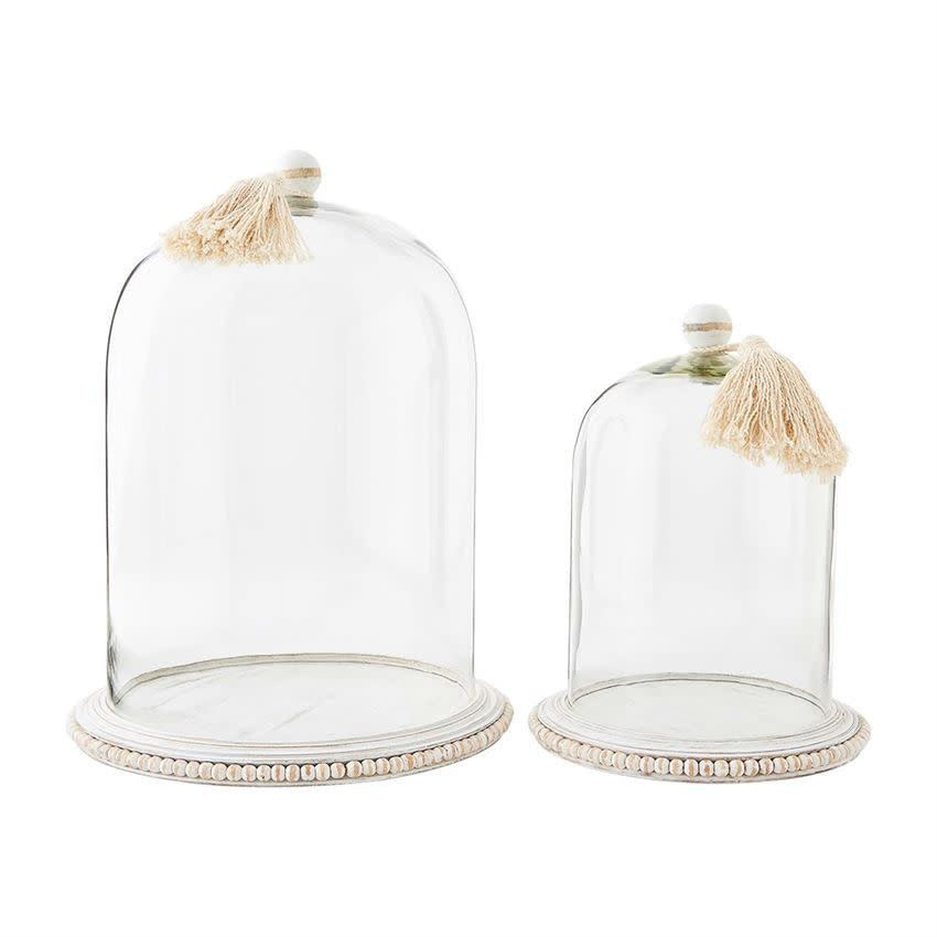 Small glass beaded cloche with mango wood handle featuring a tassel.