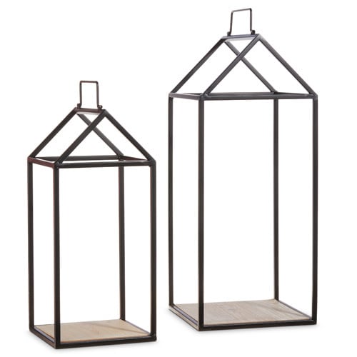 Set of black iron open lanterns with a geometric cage design.