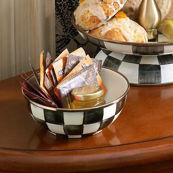 Hand-painted Courtly Check enamel bowl with glossy high-contrast checks on heavy-gauge steel and bronzed stainless rim.