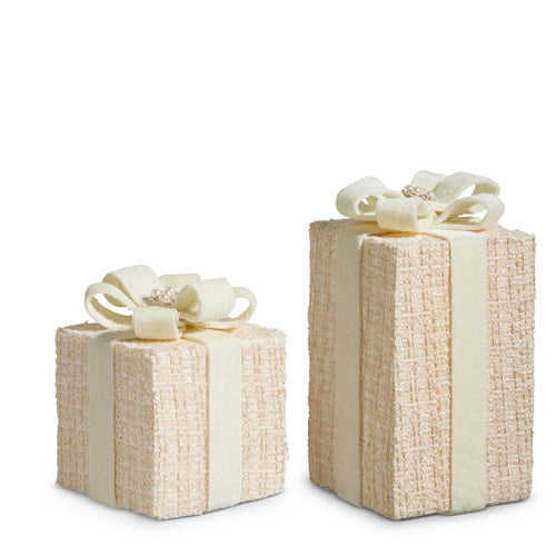 Cream polyester tweed package with foam padding inside plastic casing.