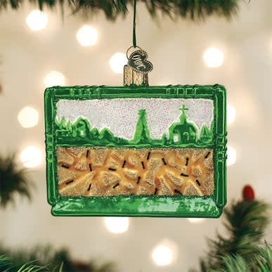 Ant Habitat Ornament: a small decorative piece with dimensions approximately one by three inches.