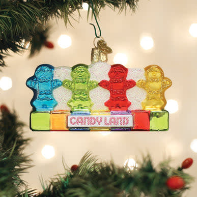 Candy Land Kids Ornament featuring a colorful candy-themed character on a glossy red and white striped background.
