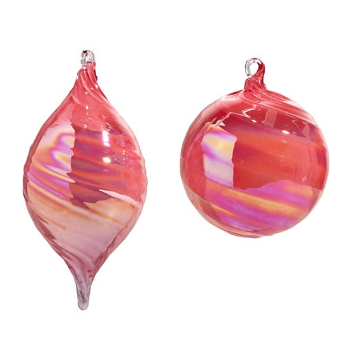 Pink blown glass Christmas ornament with a classic round shape.