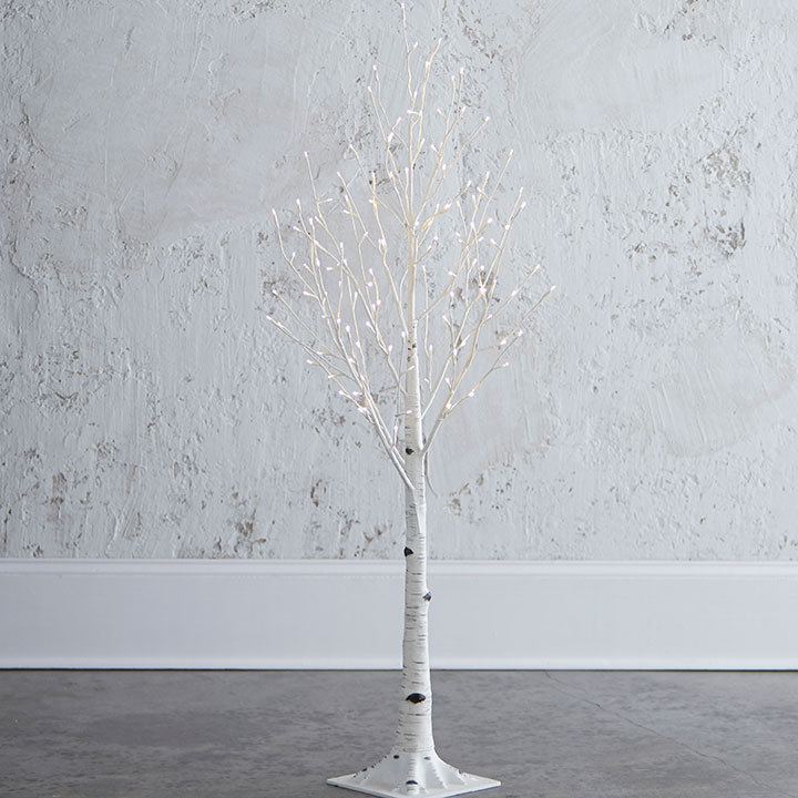 4.5-foot white plastic birch tree with warm white LED lights on steady and twinkle settings.