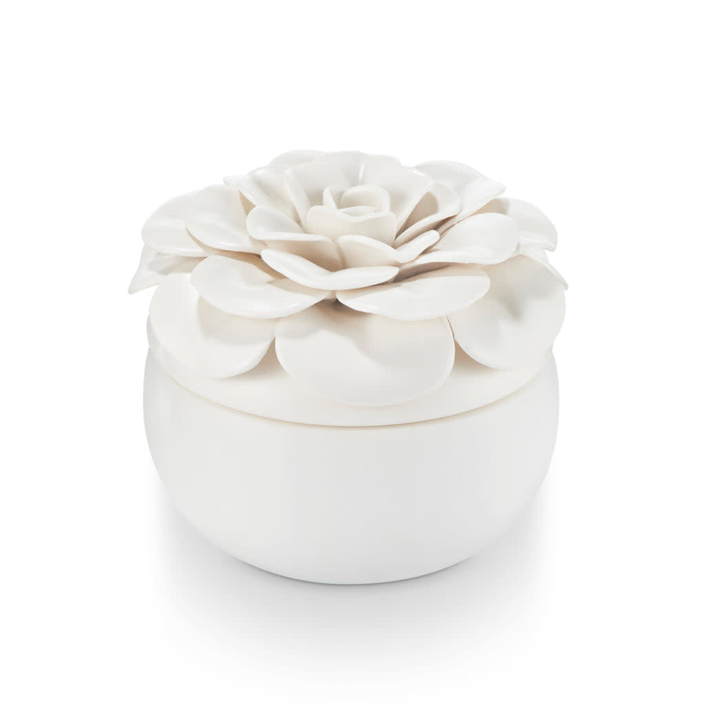 Ceramic flower candle with three wicks in a hand-placed petal bloom pattern.