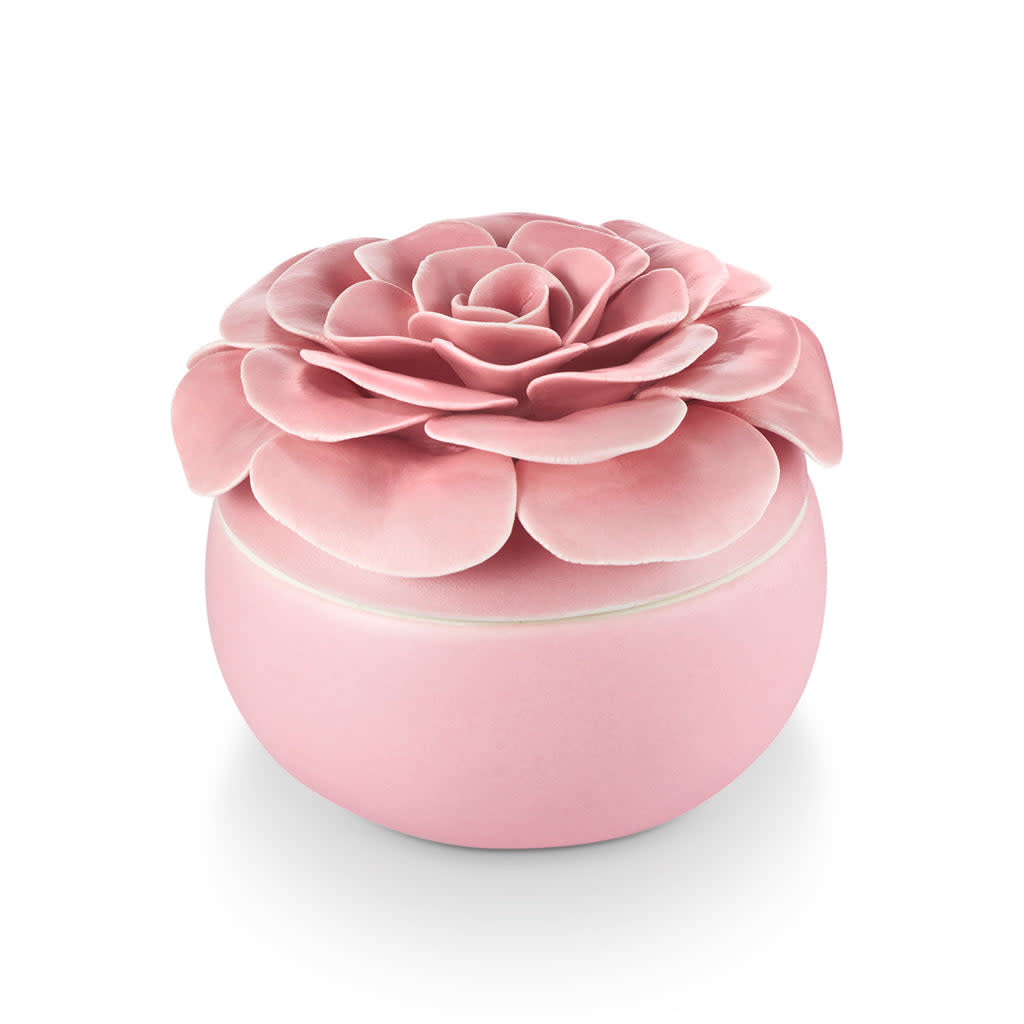 Ceramic flower candle with three wicks in petal-shaped blooms.