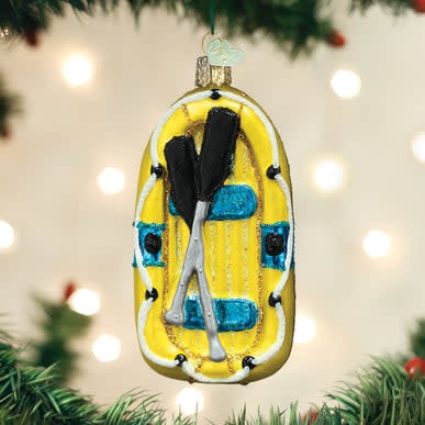 Mouth-blown glass raft ornament with silver accents in a white water theme