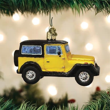 Mouth-blown glass SUV ornament with silver accents in a rugged vehicle silhouette.