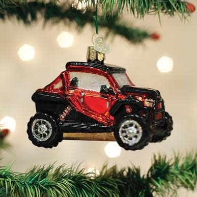 Glass ornament shaped like a side-by-side ATV with silver accents and hand-painted glitter finish.