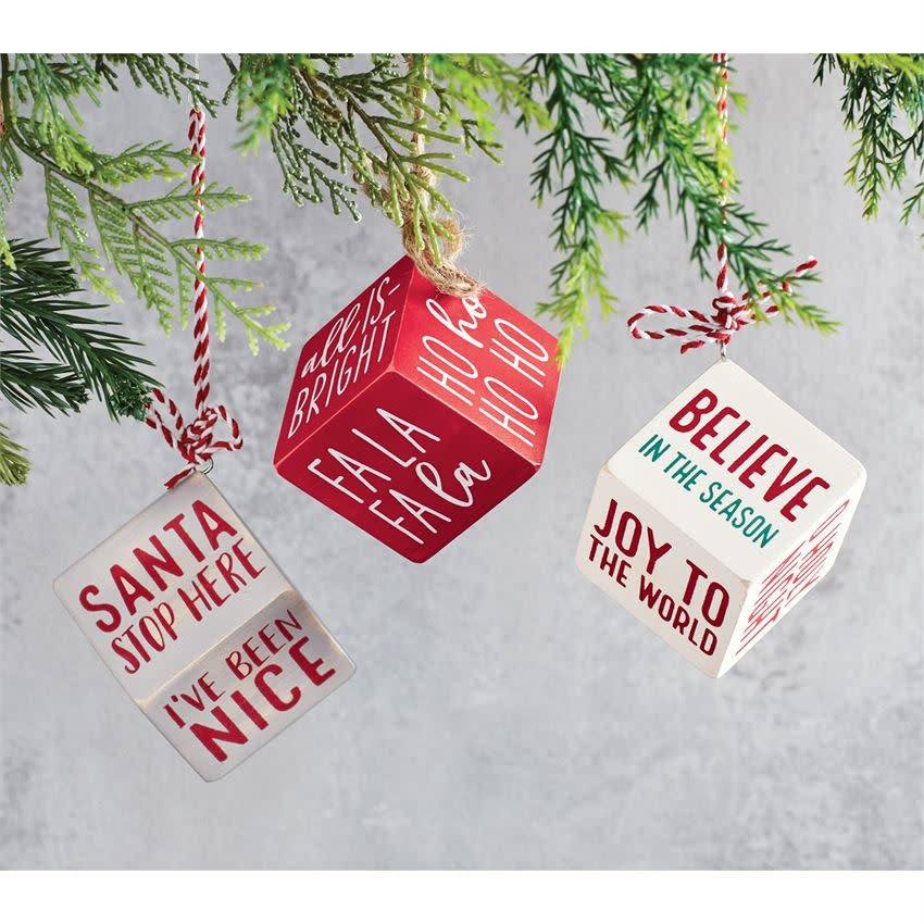 Wooden cube ornament with printed holiday sentiments on each side.