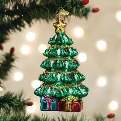Mouth-blown glass Christmas ornament with hand-painted silver finish and glitter accents.