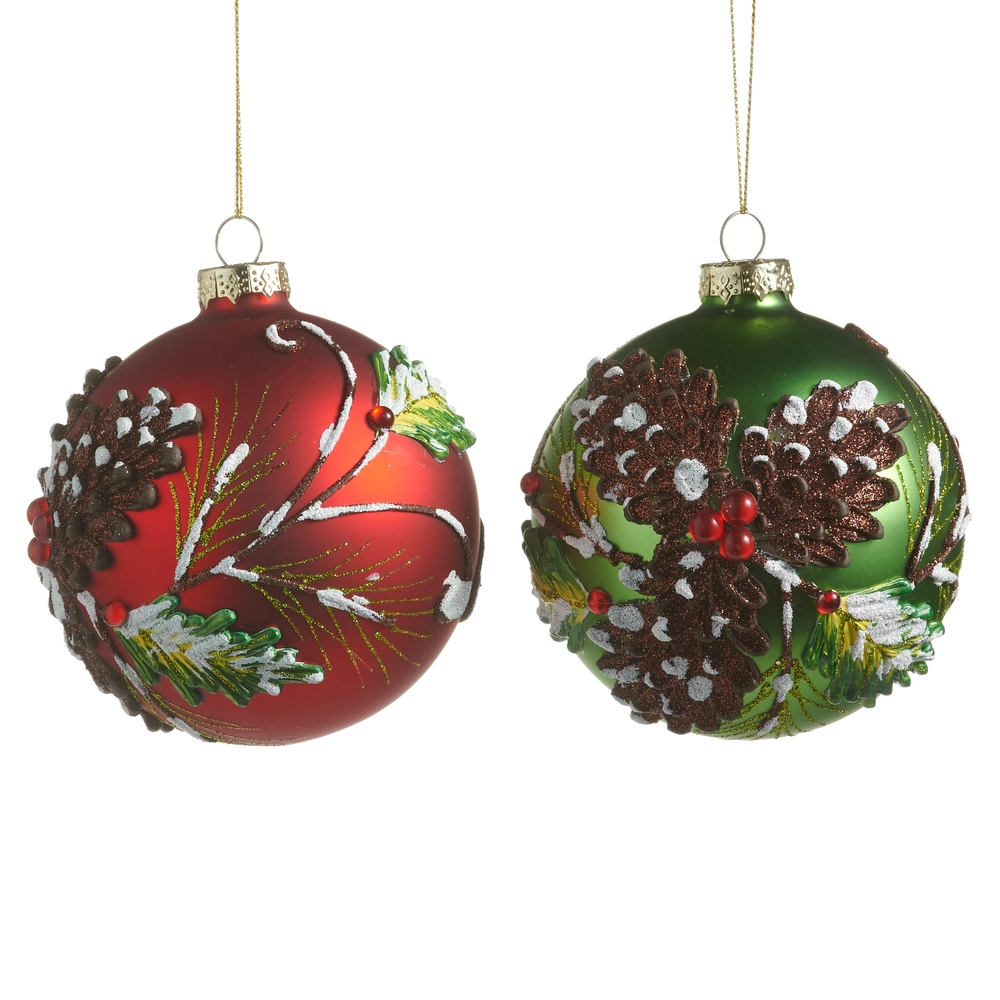 4-inch glass ball ornaments in red and green with snowy pinecone and berry designs.