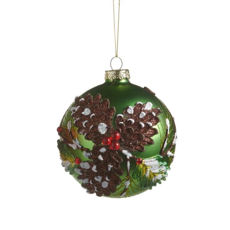 4-inch green glass ball ornament with brown snowy pinecones and red berry accents.