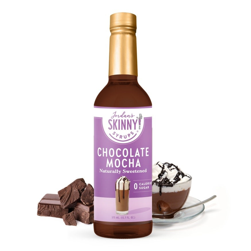 Bottle of naturally sweetened cinnamon dolce syrup with a clear label.