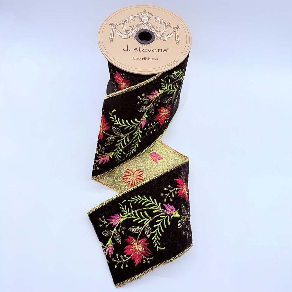 4 inch wide black velvet ribbon with red and pink floral embroidery and gold wired edges.