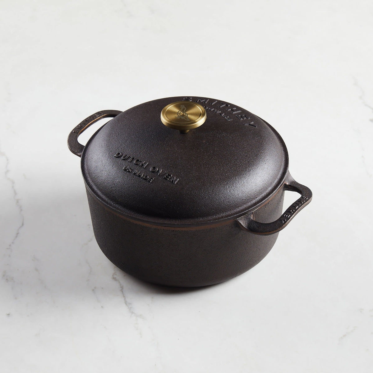 Polished interior enameled cast iron Dutch oven with domed lid