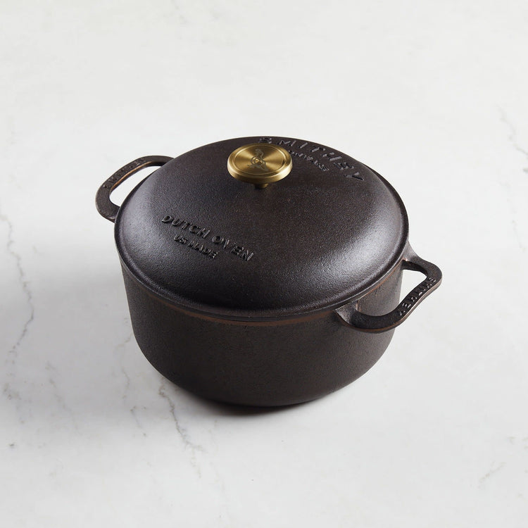 Polished interior enameled cast iron Dutch oven with domed lid