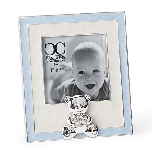 Blue wooden frame shaped like a bear head holding a baby photo