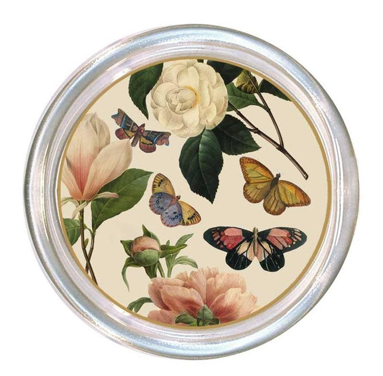 Five-inch glass coaster with high rim on ivory background featuring floral pattern.