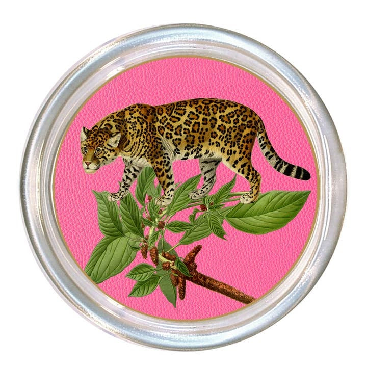 Glass coaster with leopard print on pink background, black velvet back