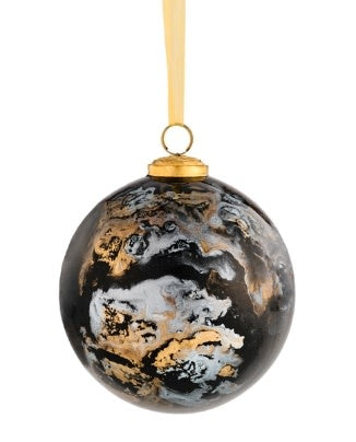 Five-inch marble glass ball ornament featuring black, gold, and white swirl patterns.