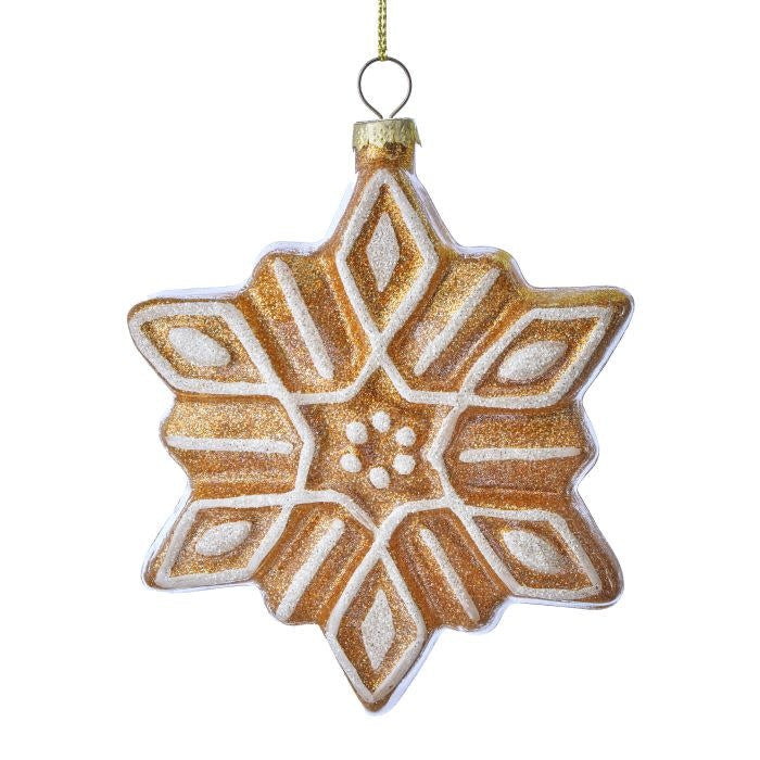 Glass gingerbread snowflake ornament with frosted cookie appearance and intricate white pattern.