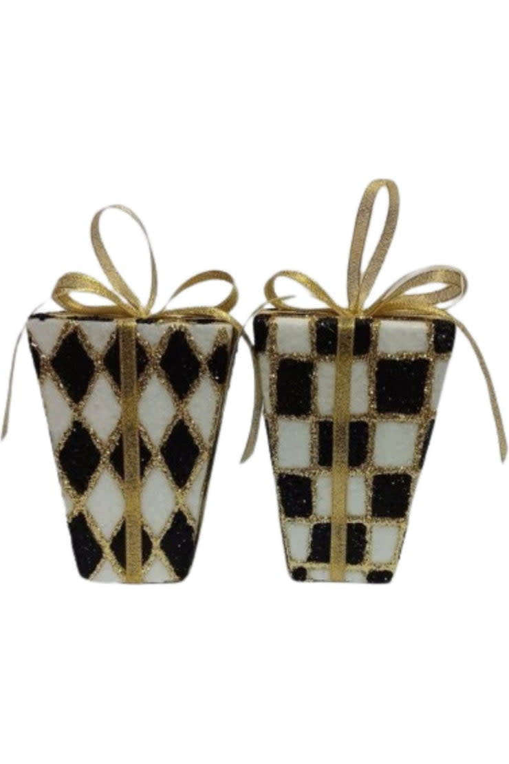 Five-inch Harlequin package ornament in gold and black with geometric pattern.