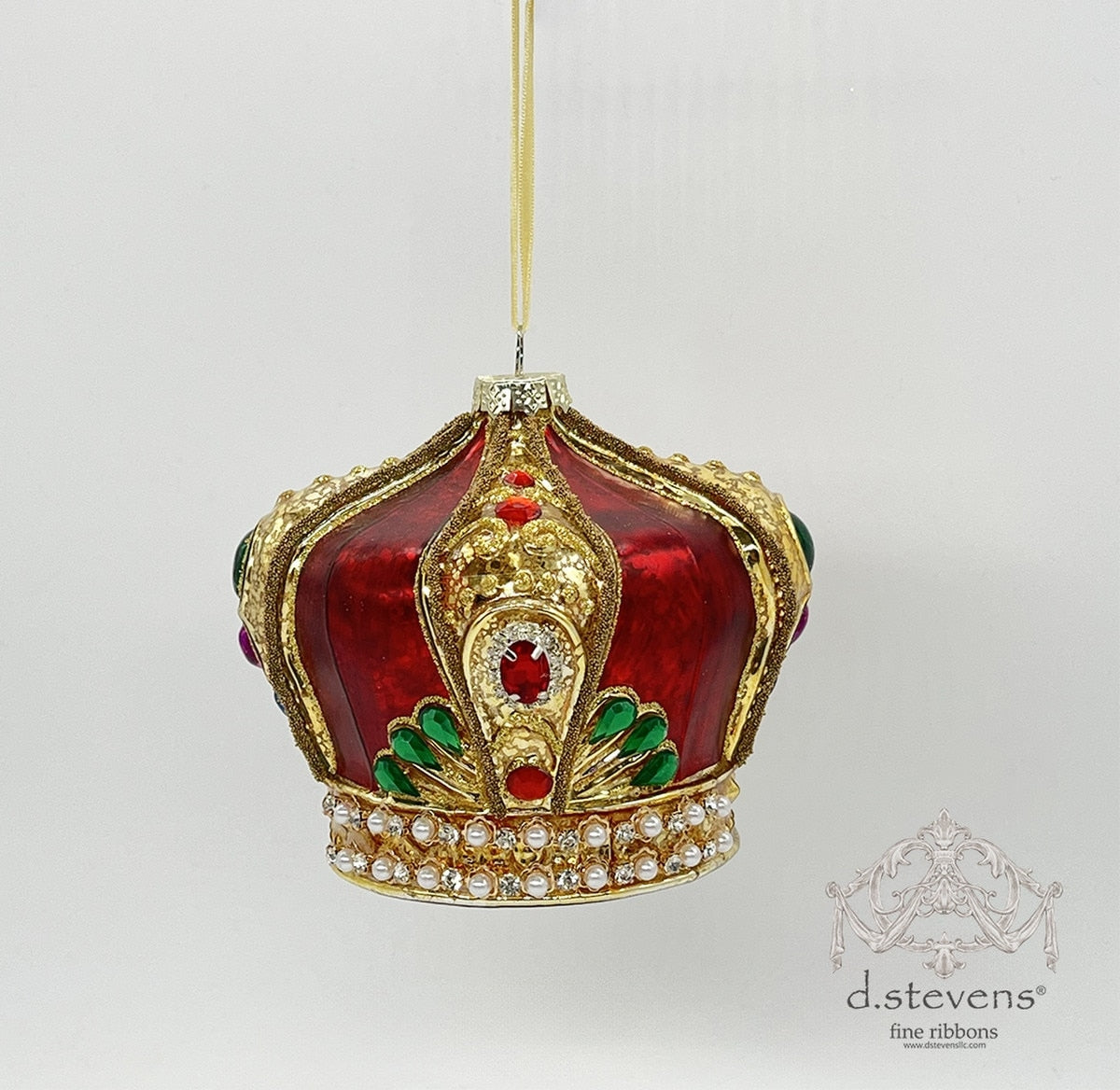 5.125-inch red glass crown ornament with gold glitter, green jewels, and pearl accents.