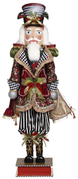 Traditional nutcracker figurine in dark wood finish with gold accents on a red uniform.