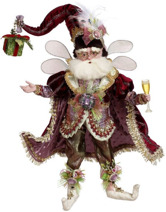 Red Christmas party fairy decoration with gold accents on a white background.