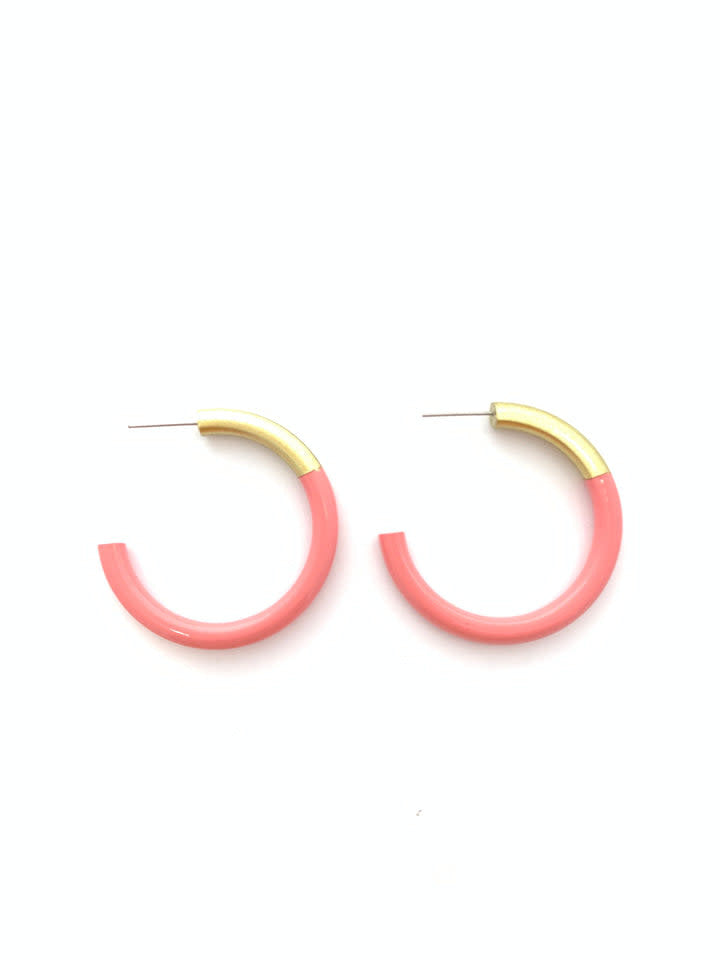 Sterling silver hoop earring with a textured geometric dimension measuring 1.5 inches.