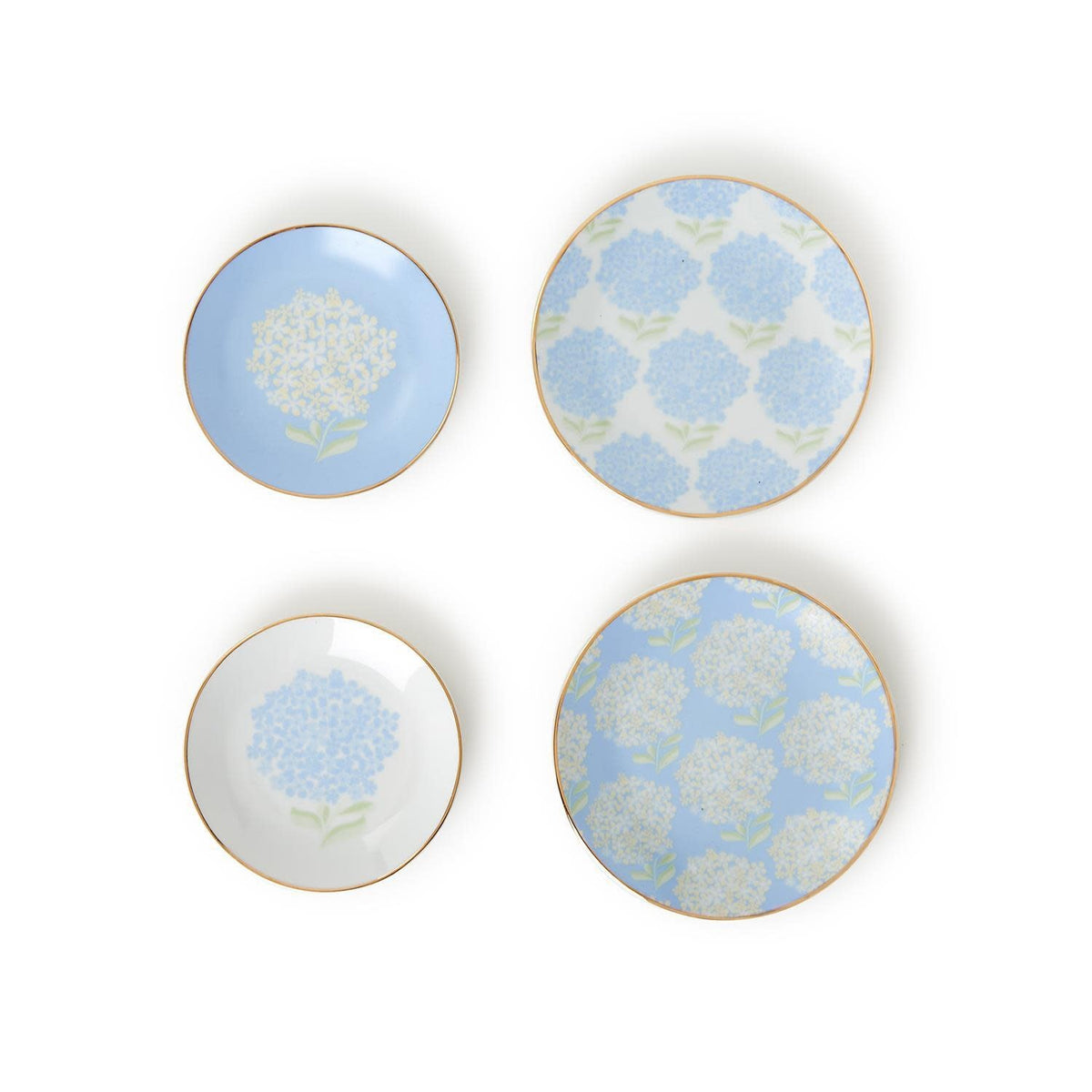 Porcelain trinket tray with gold rim featuring a blue hydrangea flower pattern