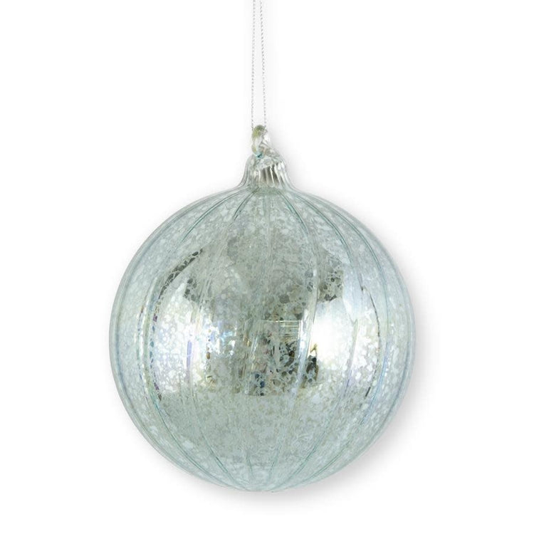 Round light blue ribbed mercury glass decorative mirror with a smooth circular silhouette.
