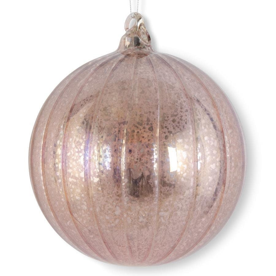 Round light pink ribbed mercury glass Christmas ornament with a reflective finish