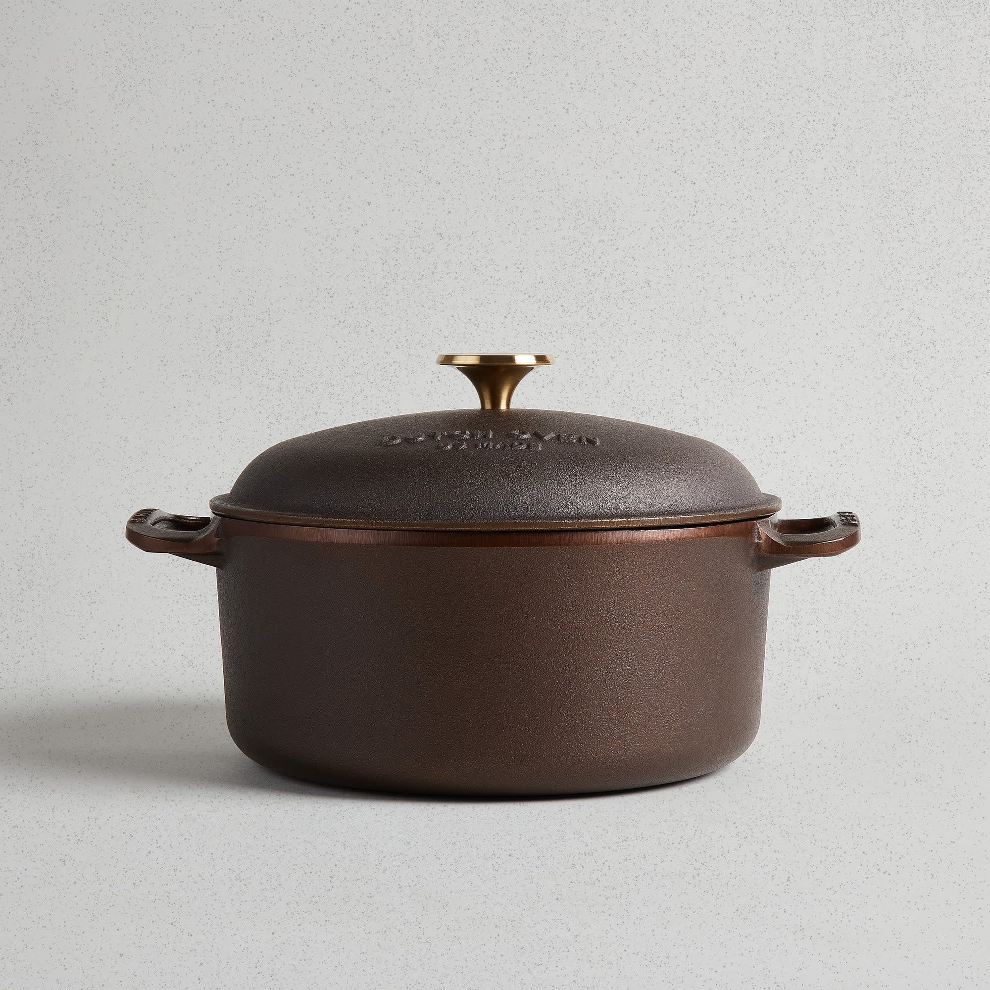 Polished interior enameled cast iron Dutch oven with domed lid