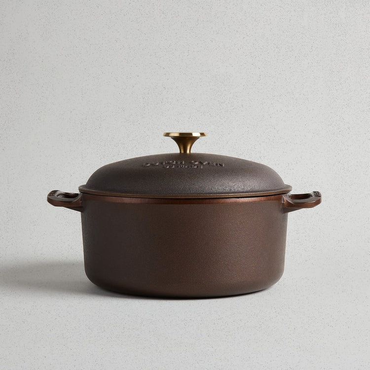 Polished interior enameled cast iron Dutch oven with domed lid