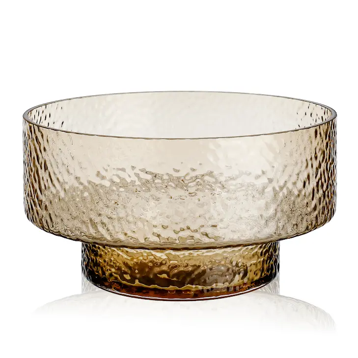 Clear glass vase with a diamond star cutout detail on the side.