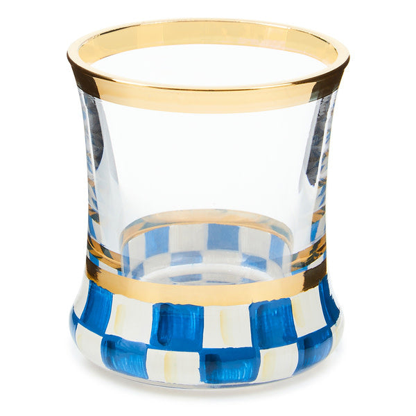 Hand-painted check shot glass with gold lustre trim on a blue base.