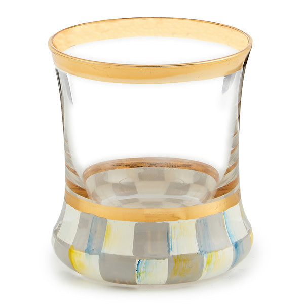 Hand-painted check shot glass with gold lustre trim on a blue base