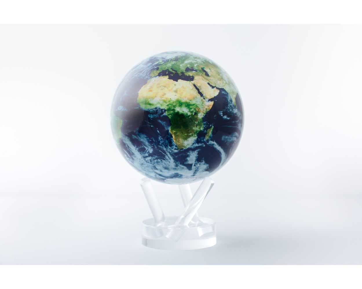 Rotating Earth globe with cloud patterns on a clear acrylic base