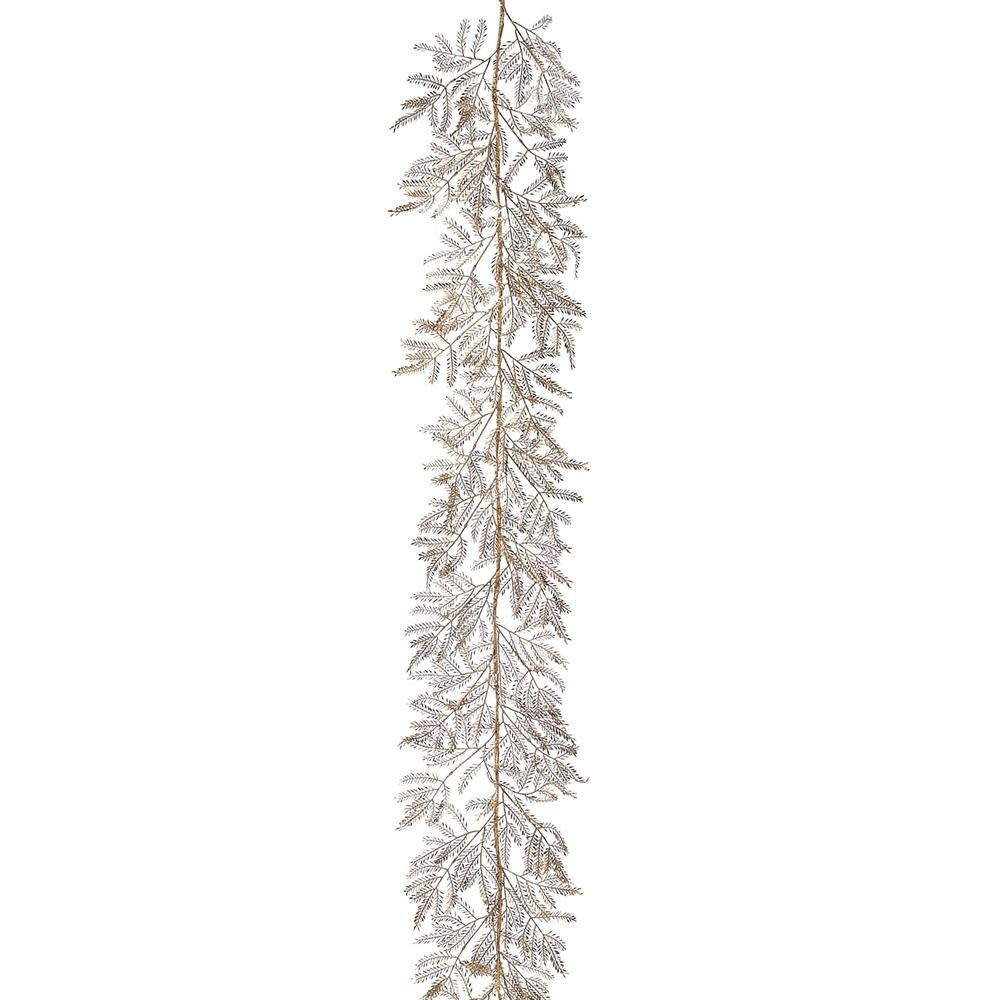 Gold metallic wire garland with plastic mimosa flower shapes strung in a flowing curve.