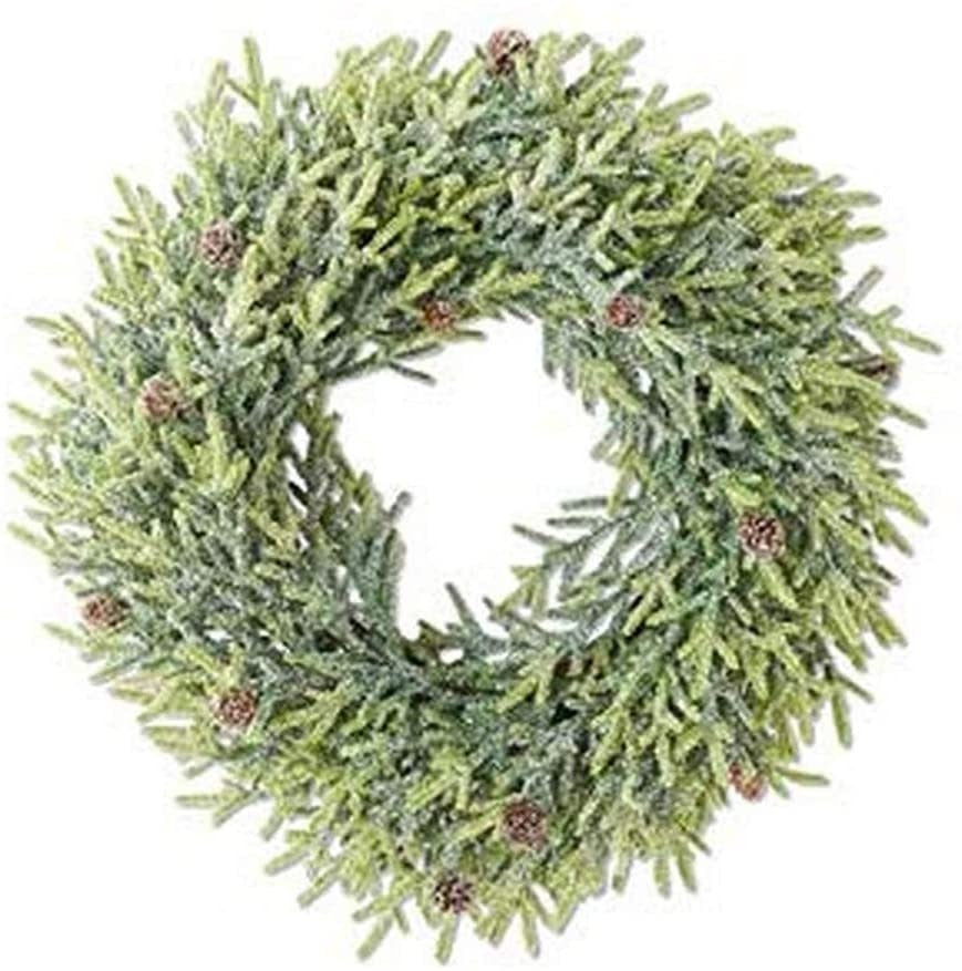 Twenty-one inch green plastic wreath with snowy juniper branches and mini pinecones.