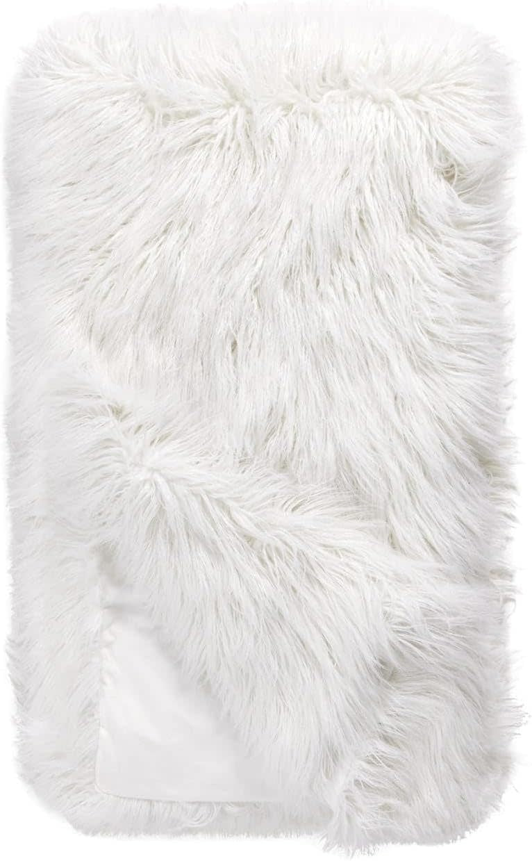 White Tibetan Lamb faux fur throw blanket with long crimped pile on a velvet lining.