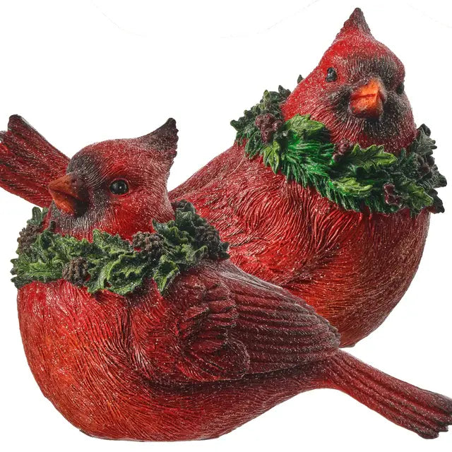6.5-inch resin glitter cardinal figurine with holly accents in red and green tones.