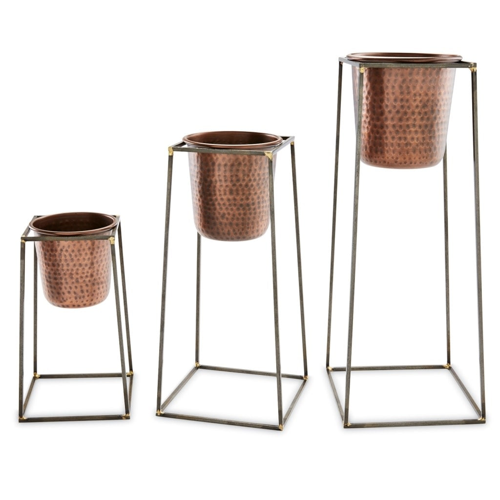 Small cast iron plant stand with removable hammered copper pot