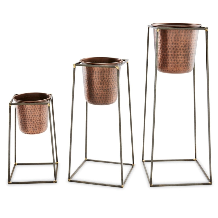 Small cast iron plant stand with removable hammered copper pot