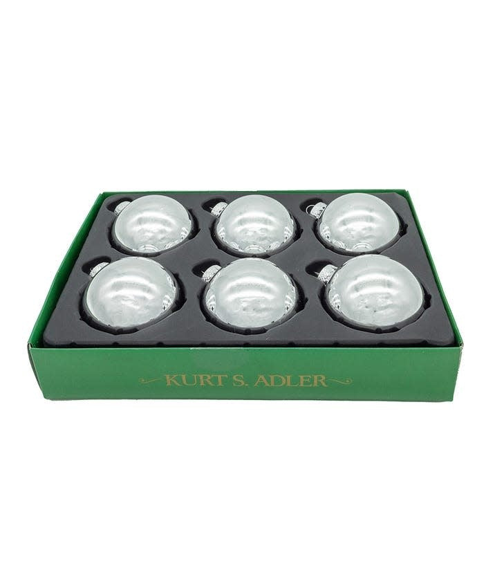 Set of six shiny silver glass ball ornaments with a reflective finish.
