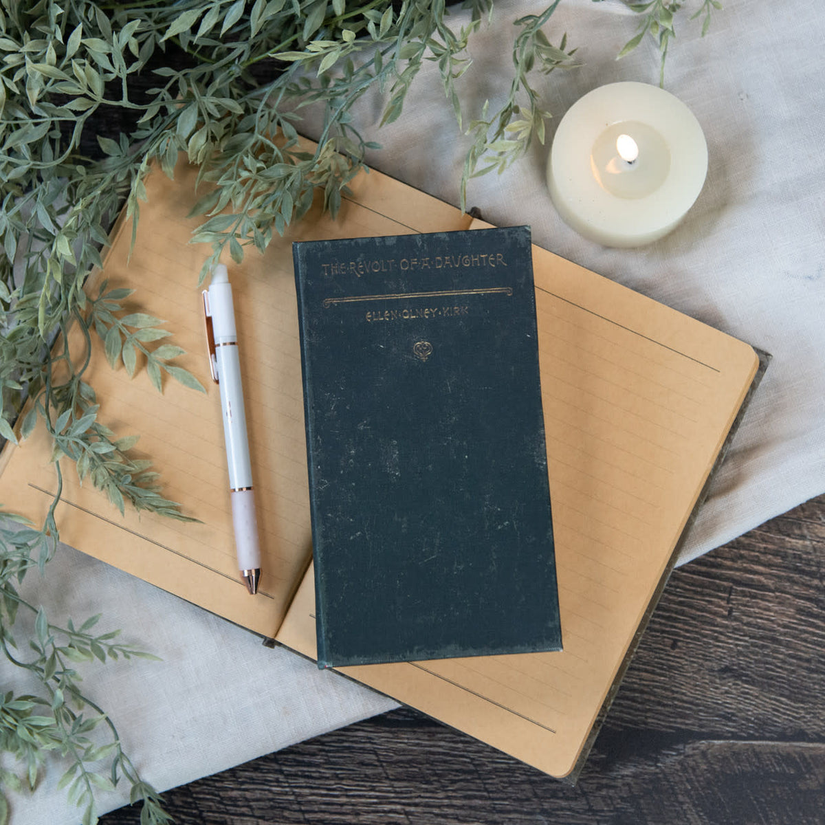 7-inch Revolt of a Daughter journal with classic wood cover.